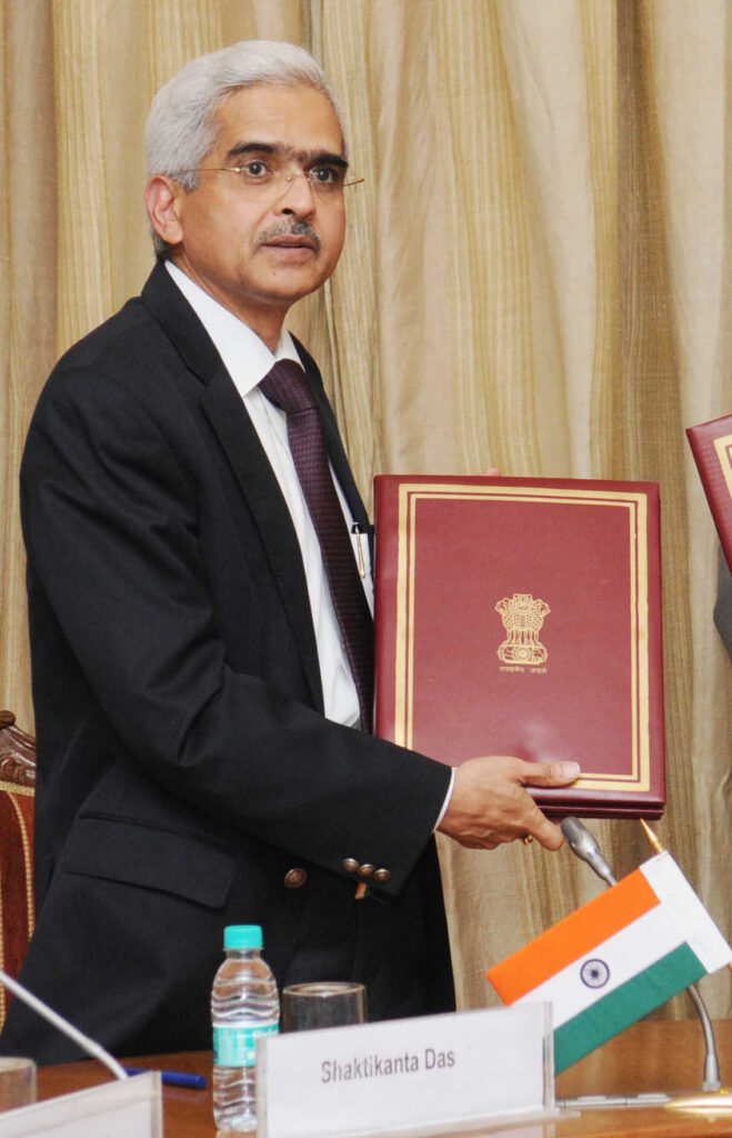 Shaktikanta_Das_IAS_signing_FATCA_cropped-659x1024 ULI (Unified Logistics Interface): Revolutionizing Lending in India for a Faster, Easier Process